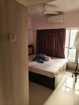 Bedroom in 2 BHK Apartment at Romell Aether, Goregaon East – for Rent