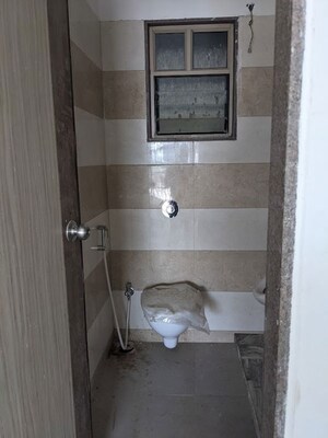 Bathroom in  Office Space at Sheladia One World West, Ambli – for Rent