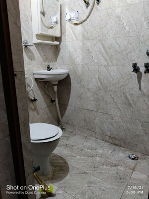 Bathroom in 1 RK Apartment at Godavari Shopping Complex, Sector 37 – for Rent