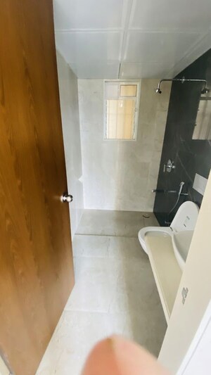 Bathroom in 2 BHK Apartment at Dosti West County, Balkum Pada – for Rent