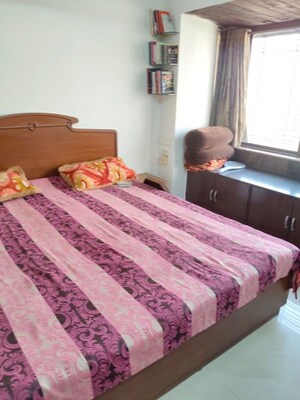 Bedroom in 2 BHK Apartment at Evershine Greens, Andheri West – for Sale