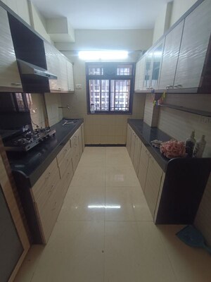 Kitchen in 2 BHK Apartment at Pleasant CHS Malad, Malad West – for Rent