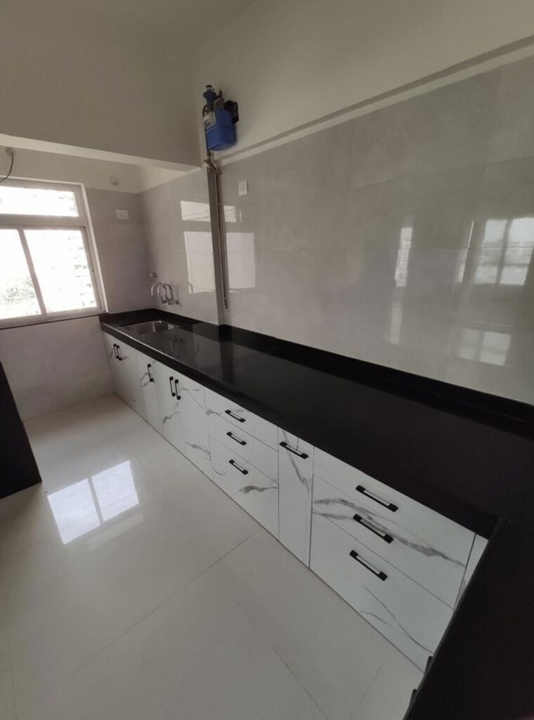 Kitchen, 173-west-oaks 2 Bedroom 1100 Sq.Ft. Apartment In Wakad Pune 10299684