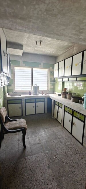 Kitchen in 4 BHK Apartment at Mehrdad CHS, Cuffe Parade – for Sale
