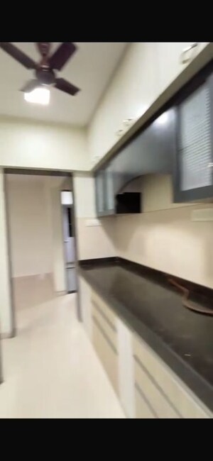 Kitchen in 2 BHK Apartment at Siddhi Highland Haven, Balkum Pada – for Rent