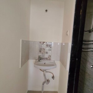 Bathroom in 2 BHK Apartment at Wakad – for Rent