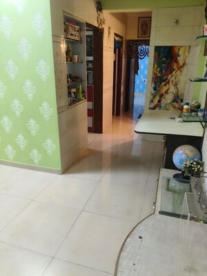 Living Room in 2 BHK Apartment at Triveni Garden, Khadakpada – for Sale