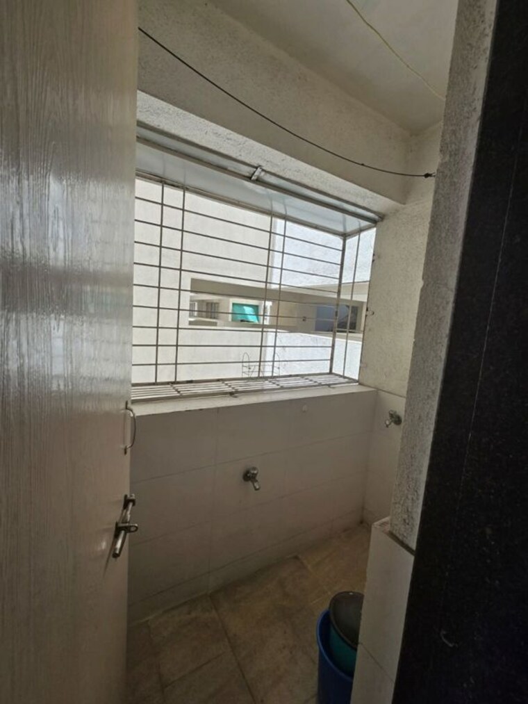 Bathroom, wakad 2 Bedroom 900 Sq.Ft. Apartment In Wakad Pune 10300916