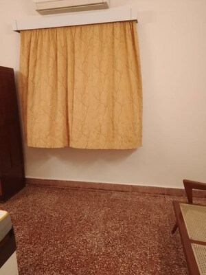 Bedroom in 1 BHK Apartment at Usha Sadan Apartment, Colaba – for Rent