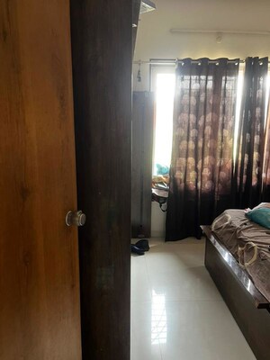 Bedroom in 2 BHK Apartment at S P Carnation, Pimple Saudagar – for Rent