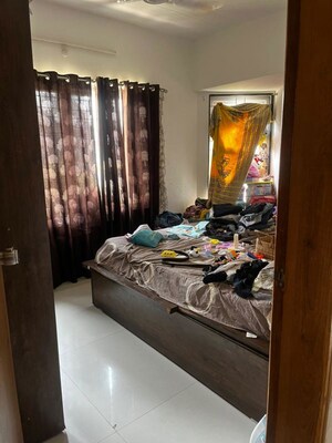 Bedroom in 2 BHK Apartment at S P Carnation, Pimple Saudagar – for Rent