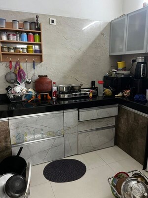 Kitchen in 2 BHK Apartment at S P Carnation, Pimple Saudagar – for Rent