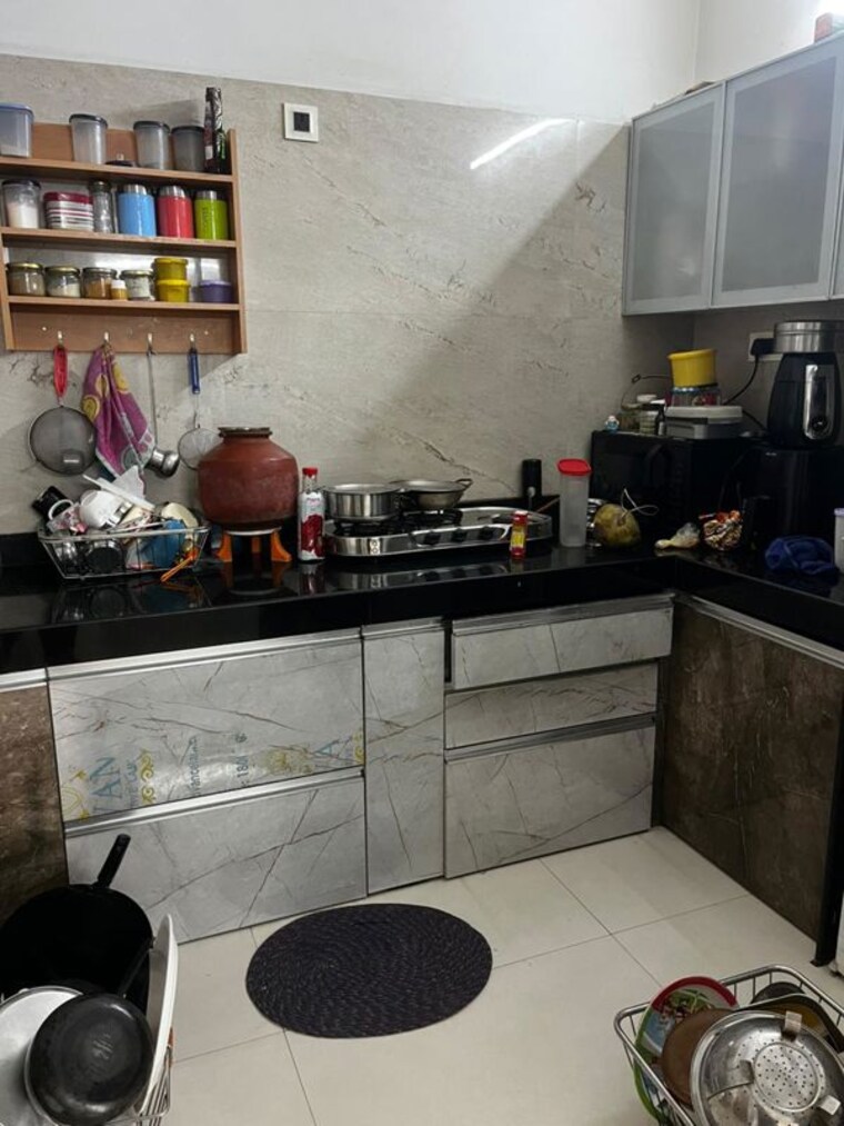 Kitchen, s-p-carnation 2 Bedroom 900 Sq.Ft. Apartment In Pimple Saudagar Pune 10301041