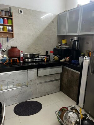Kitchen in 2 BHK Apartment at S P Carnation, Pimple Saudagar – for Rent