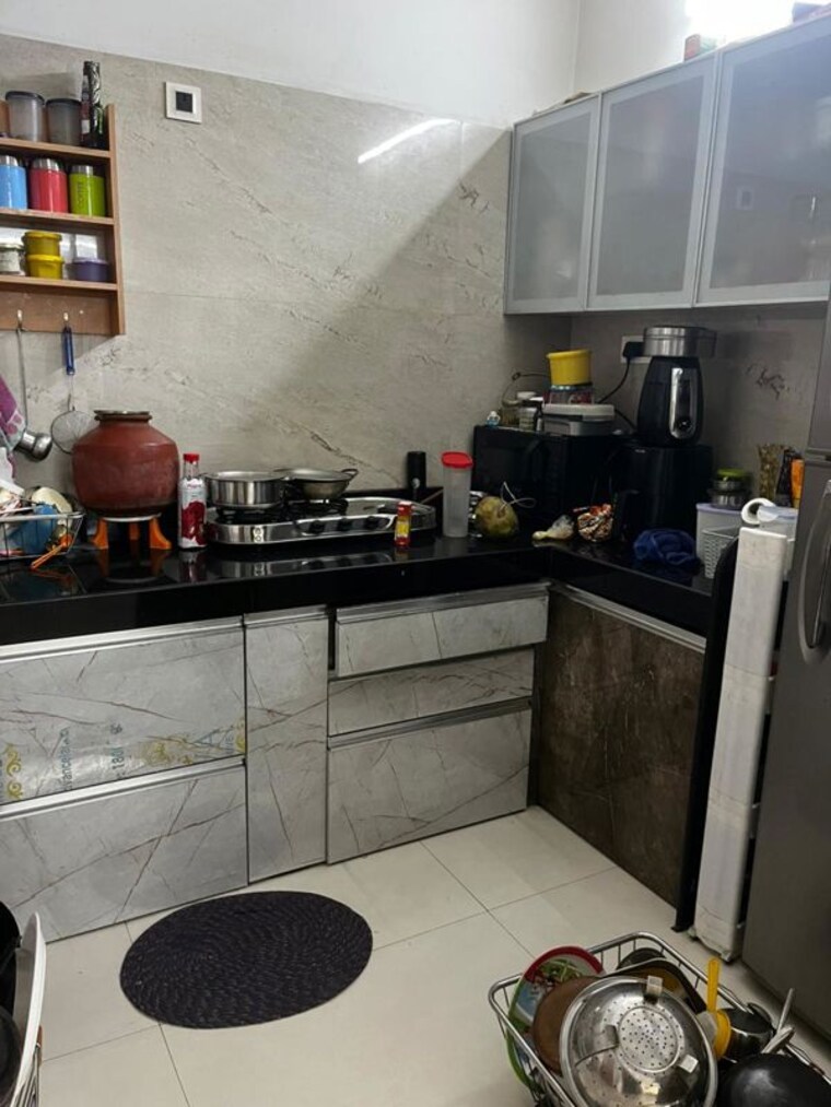 Kitchen, s-p-carnation 2 Bedroom 900 Sq.Ft. Apartment In Pimple Saudagar Pune 10301041