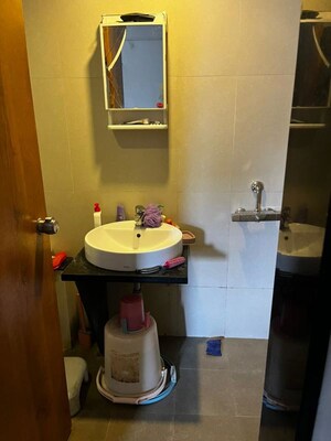 Bathroom in 2 BHK Apartment at S P Carnation, Pimple Saudagar – for Rent