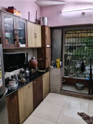 Kitchen in 2 BHK Apartment at Triveni Garden, Khadakpada – for Sale