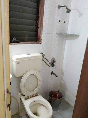 Bathroom in 2 BHK Apartment at Triveni Garden, Khadakpada – for Sale
