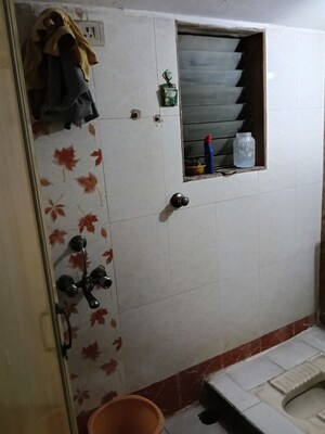 Bathroom in 2 BHK Apartment at Triveni Garden, Khadakpada – for Sale