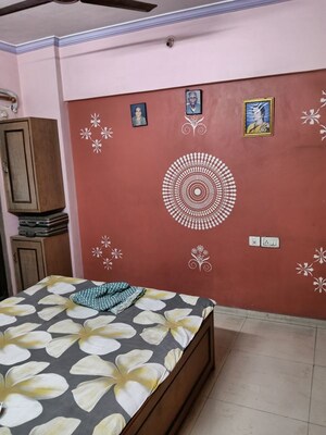 Bedroom in 2 BHK Apartment at Triveni Garden, Khadakpada – for Sale