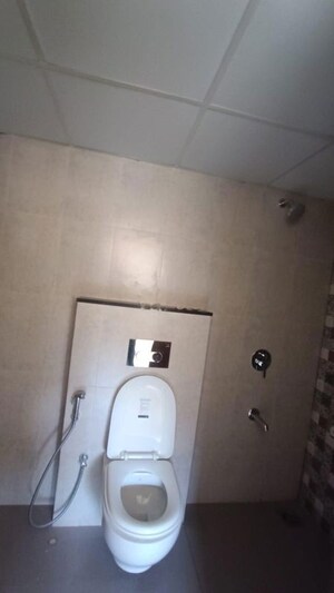 Bathroom in 3 BHK Apartment at Shapoorji Pallonji Vanaha Golfland, Bavdhan – for Rent