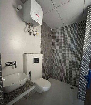 Bathroom in 3 BHK Apartment at Affinity Greens, International Airport Road – for Rent