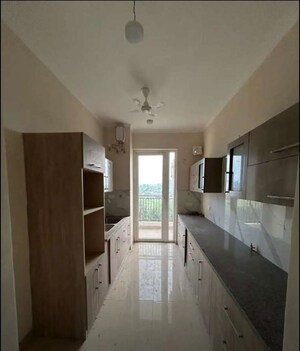 Kitchen in 3 BHK Apartment at Affinity Greens, International Airport Road – for Rent