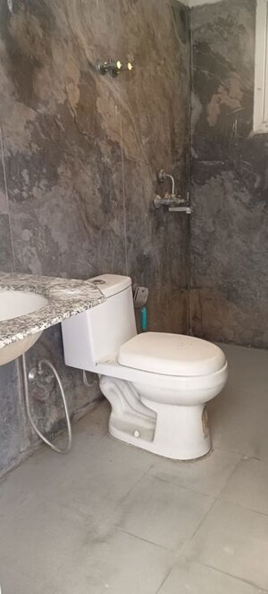 Bathroom in 3 BHK Apartment at Pardos Okas Residency, Sushant Golf City – for Rent