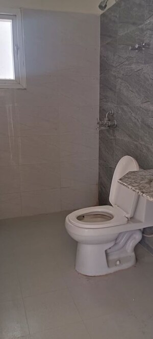 Bathroom in 3 BHK Apartment at Pardos Okas Residency, Sushant Golf City – for Rent