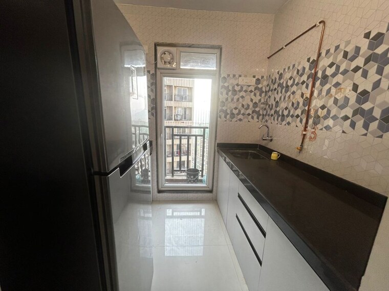 Balcony, paradigm-zenith-pushpanjali-residency-phase-iii 2 Bedroom 600 Sq.Ft. Apartment In Ghodbunder Road Thane 10301622