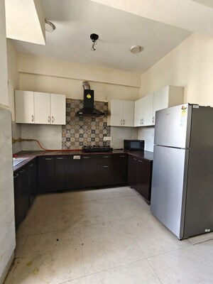Kitchen in 3.5 BHK Apartment at Aims Golf City, Sector 75 – for Rent