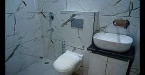 Bathroom in 1 BHK Apartment at Alliance The Eminence, Singhpura – for Rent