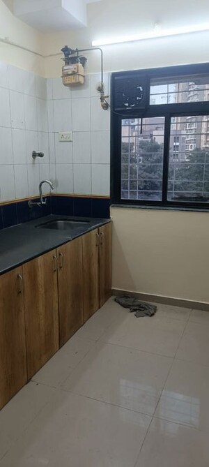Kitchen in 2 BHK Apartment at Vihang Vermont, Ghodbunder Road – for Rent