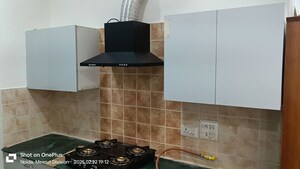 Kitchen in 2 BHK Apartment at Aims Golf City, Sector 75 – for Rent