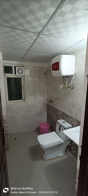 Bathroom in 2 BHK Apartment at Aims Golf City, Sector 75 – for Rent