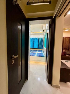 Building Lobby in 2 BHK Apartment at Lalani Grandeur, Goregaon East – for Rent