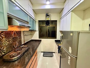Kitchen in 2 BHK Apartment at Lalani Grandeur, Goregaon East – for Rent