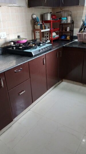 Kitchen in 2 BHK Apartment at Gaurs Cascades, Raj Nagar Extension – for Rent