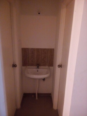Bathroom in 1 BHK Apartment at Shagun Sunshine Hills, Pisoli – for Rent