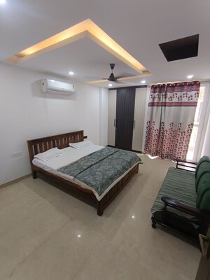 Bedroom in 4 BHK Builder Floor at Sushant Lok Iii – for Rent