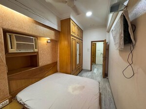 Bedroom in 2 BHK Apartment at Prabhadevi CHS, Prabhadevi – for Rent