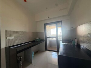 Kitchen in 2 BHK Apartment at Dhuru Wadi – for Sale