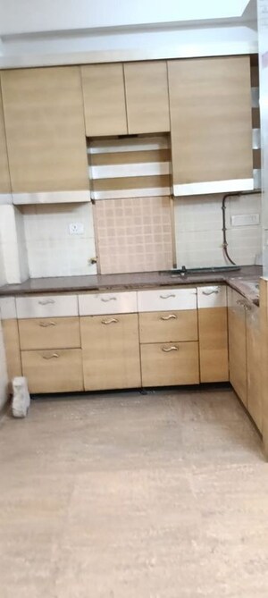 Kitchen in 2 BHK Apartment at Niti Khand I – for Sale