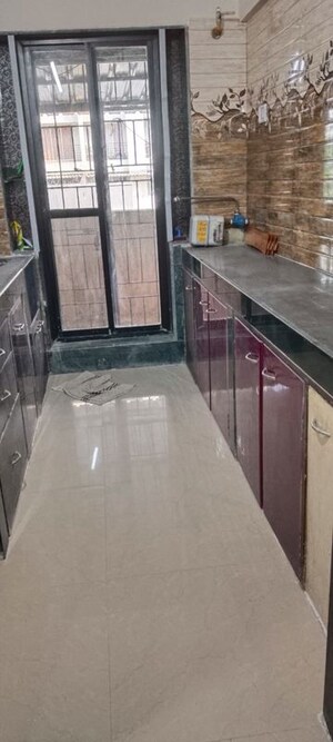 Kitchen in 2 BHK Apartment at Kailash CHS Kopar Khairane, Kopar Khairane – for Sale
