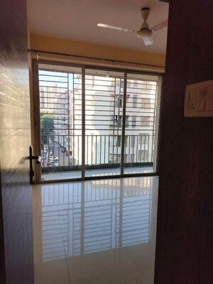 Room in 2 BHK Apartment at Satellite Garden, Goregaon East – for Rent