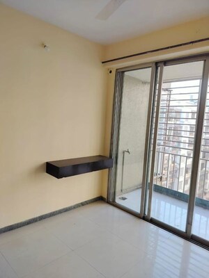 Room in 2 BHK Apartment at Satellite Garden, Goregaon East – for Rent