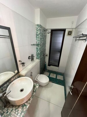Bathroom in 2 BHK Apartment at Satellite Garden, Goregaon East – for Rent