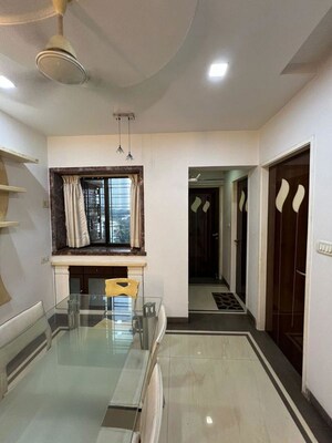 Living Room in 2 BHK Apartment at Satellite Garden, Goregaon East – for Rent
