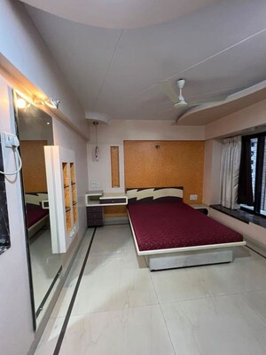 Living Room in 2 BHK Apartment at Satellite Garden, Goregaon East – for Rent