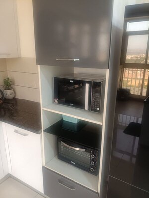 Kitchen in 2.5 BHK Apartment at Paradigm Business Hermitage Park, Dhakoli – for Rent